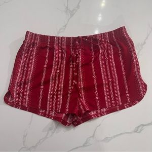 Red and White shorts size XL never worn
